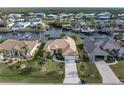 Property is situated on the water with boat access and nearby homes at 5430 Almar Dr, Punta Gorda, FL 33950