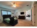 Bright bedroom with a TV and plenty of space for furniture at 24157 Green Heron Dr # 27, Punta Gorda, FL 33980