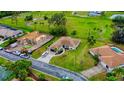 Bird's-eye view of a house and surrounding neighborhood at 245 Brighton Ct, Englewood, FL 34223