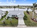 Single-story home on a golf course with a lake view at 3749 Bordeaux Dr, Punta Gorda, FL 33950