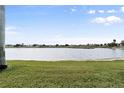 Serene view of a lake and lush green landscape at 3749 Bordeaux Dr, Punta Gorda, FL 33950