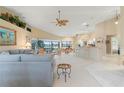 Spacious living room with access to kitchen and water view at 3749 Bordeaux Dr, Punta Gorda, FL 33950