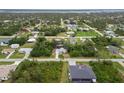 Aerial view showcasing the home's location in a residential neighborhood at 5452 Montego Ln, Port Charlotte, FL 33981