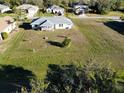 House with large backyard and surrounding houses at 25075 Palisade Rd, Punta Gorda, FL 33983