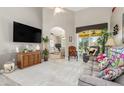 Relaxing living room with a view of the pool and comfortable seating at 1020 Caliva St, North Port, FL 34286