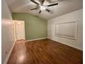 Spacious living room with hardwood floors and high ceilings at 18085 Wintergarden Ave, Port Charlotte, FL 33948