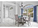 Bright dining room with table and chairs near window at 474 Orlando Blvd, Port Charlotte, FL 33954