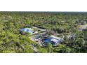 Bird's eye view of house and surrounding neighborhood at 489 & 497 Campbell St, Port Charlotte, FL 33953