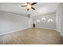 Spacious living room with tile floors and vaulted ceilings at 4959 Cromey Rd, North Port, FL 34288