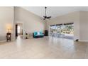 Spacious living area with tile floors and access to the pool at 7543 S Blue Sage, Punta Gorda, FL 33955