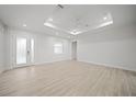 Bright living room with tile flooring and neutral color palette at 85 Snedeker St, Port Charlotte, FL 33954