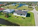 Elevated view of home, highlighting its position and backyard at 16322 Nogales Ct, Punta Gorda, FL 33955