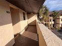 Private balcony overlooking the parking lot at 2395 Harbor Blvd # 324B, Port Charlotte, FL 33952