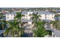 Condo building with parking and tropical landscaping at 3640 Bal Harbor Blvd # 313, Punta Gorda, FL 33950