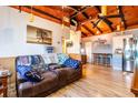 Relaxing living room with leather couch and wood accent walls at 159 Date St, Punta Gorda, FL 33980