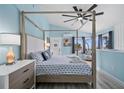 Spacious main bedroom with a large bed and ocean views at 2726 N Beach Rd, Englewood, FL 34223