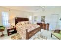 Spacious bedroom with a king-size bed and wooden furniture at 1640 Atares Dr # 31, Punta Gorda, FL 33950