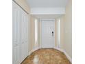 Bright entryway with tiled floor and closet at 1890 Deborah Dr # 14, Punta Gorda, FL 33950