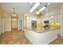 Modern kitchen with granite countertops and custom cabinets at 1890 Deborah Dr # 14, Punta Gorda, FL 33950