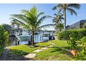 Enjoy waterfront living with private boat dock and beautiful canal views at 3800 Carupano Ct, Punta Gorda, FL 33950