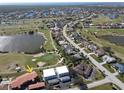 Condo community shown in wider aerial view, near golf course at 3919 San Rocco Dr # 31A, Punta Gorda, FL 33950