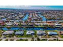Aerial view of waterfront home with private dock and canal access at 529 Belvedere Ct, Punta Gorda, FL 33950