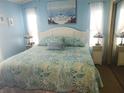 Spacious main bedroom with king-size bed and calming decor at 6501 Center Ln, North Port, FL 34287