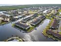 Aerial view of waterfront condo building and canal at 4000 Bal Harbor Blvd # 225, Punta Gorda, FL 33950