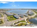 Aerial view showcasing home's waterfront location at 500 Blue Shell Loop, Sarasota, FL 34240