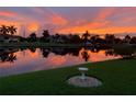 Stunning sunset over the canal at 716 Monaco Dr, Punta Gorda, FL 33950