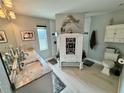 Stylish bathroom featuring double sinks, a decorative cabinet, and elegant fixtures at 3714 Gulfbreeze Ln, Punta Gorda, FL 33950