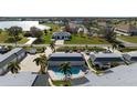 Aerial view of the condo complex with a swimming pool and community at 1340 San Cristobal Ave # 304, Punta Gorda, FL 33983