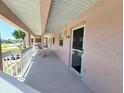 Condo hallway with access to individual units at 179 Boundary Blvd # 7, Rotonda West, FL 33947