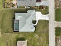 Top-down view of home showing pool and driveway at 256 Mariner Ln, Rotonda West, FL 33947