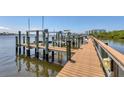 Wooden boardwalk leads to private boat docks at 1375 Beach Rd # 210, Englewood, FL 34223