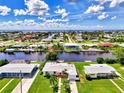 Wide aerial showcasing waterfront community at 544 Lindley Ter, Port Charlotte, FL 33952