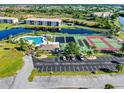 Community features tennis courts, pool, and clubhouse at 175 Kings Hwy # 233, Punta Gorda, FL 33983