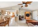 Spacious living room with hardwood floors and a ceiling fan at 10075 Stonecrop Ave, Englewood, FL 34224