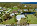 Aerial view of single Gathering home with large backyard at 5105 Ackley Ter, Port Charlotte, FL 33981