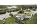 Bird's-eye view of waterfront property with boat and dock access at 446 Court St, Englewood, FL 34223