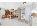 Bright dining room featuring a table, chairs, and built-in hutch at 5826 Harrison Rd, Venice, FL 34293