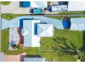 Bird's eye view of a house, driveway, and surrounding yard at 2075 Pennsylvania Ave, Englewood, FL 34224