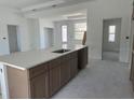 Modern kitchen featuring a large island and ample cabinet space at 7351 Lighthouse St, Englewood, FL 34224