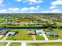 Aerial view of a luxury home community with waterfront property at 912 Boundary Blvd, Rotonda West, FL 33947