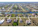 Aerial view of the property and neighborhood, highlighting the house's location at 738 Boundary Blvd, Rotonda West, FL 33947