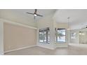 Living room with pool view and light hardwood floors at 1171 Yarmouth St, Port Charlotte, FL 33952