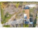 Overhead view of a home under construction on a large lot at 1665 Manor Rd, Englewood, FL 34223