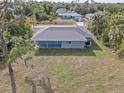 New construction home with covered patio and spacious backyard at 2462 Ensenada Ln, North Port, FL 34286