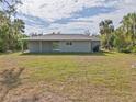 New construction home with a covered patio and large backyard at 2462 Ensenada Ln, North Port, FL 34286