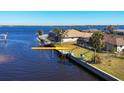 Private dock and boat lift on a wide canal at 2483 Dixon Ter, Port Charlotte, FL 33981